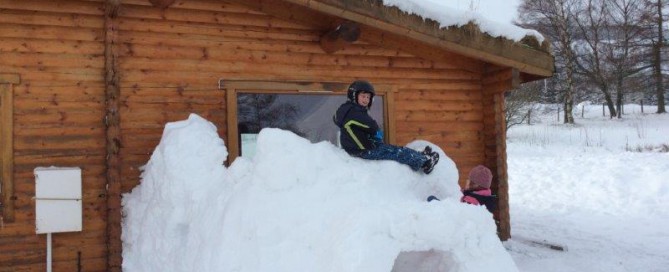 Snow Fun at the Log Cabins